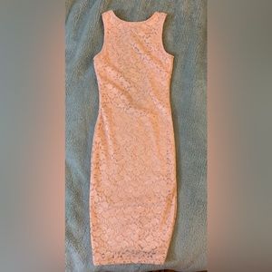 Light pink lace design dress.